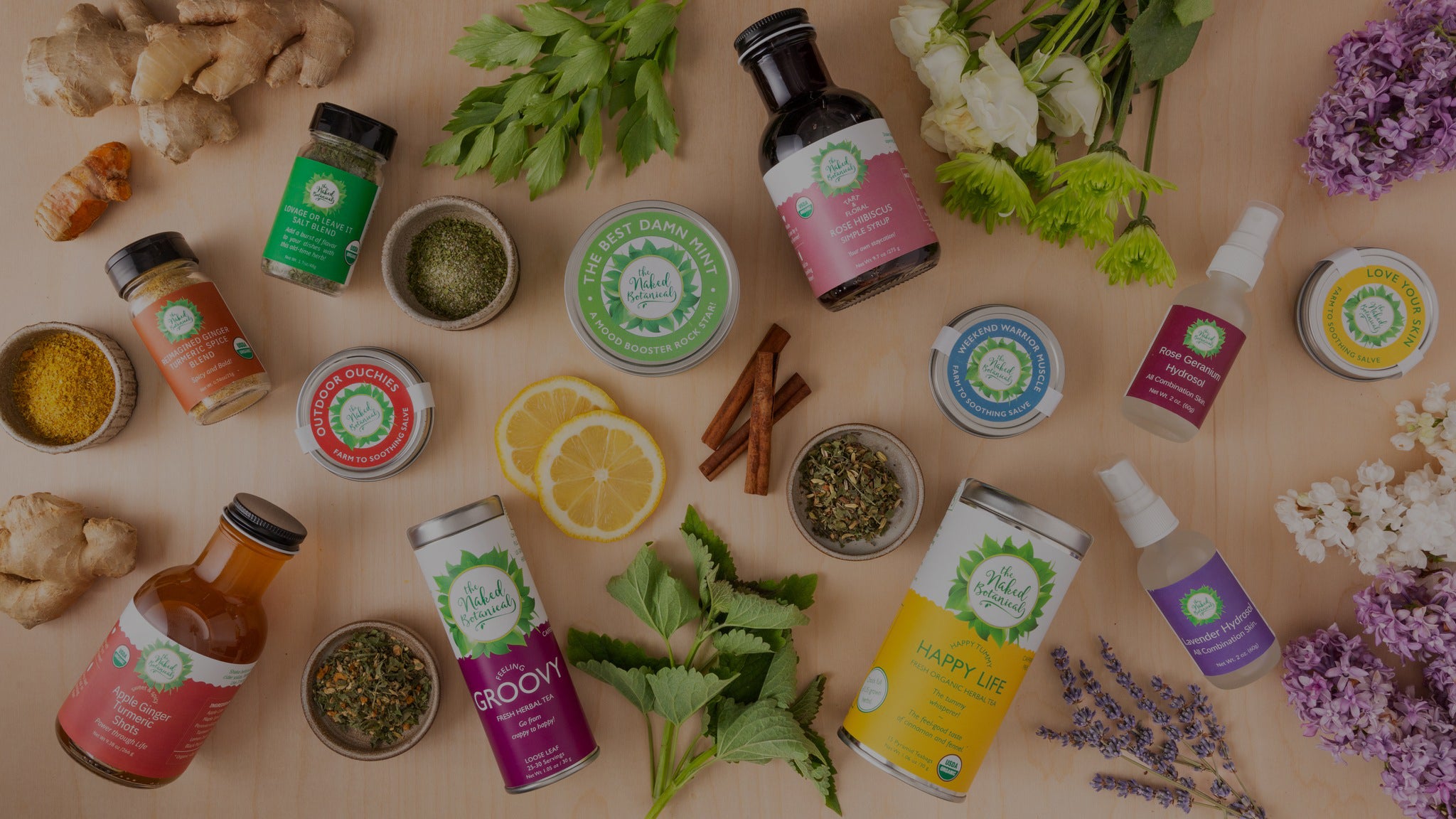 NB Banner showcasing all USA grown, farm-fresh organic products from The Naked Botanical, including herbal teas, salves, tinctures, and wellness botanicals